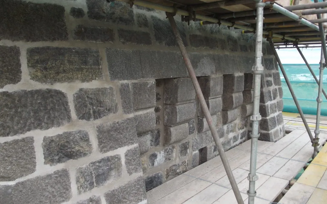 Lime mortar pointing repair work on the Lewis War Memorial stonework